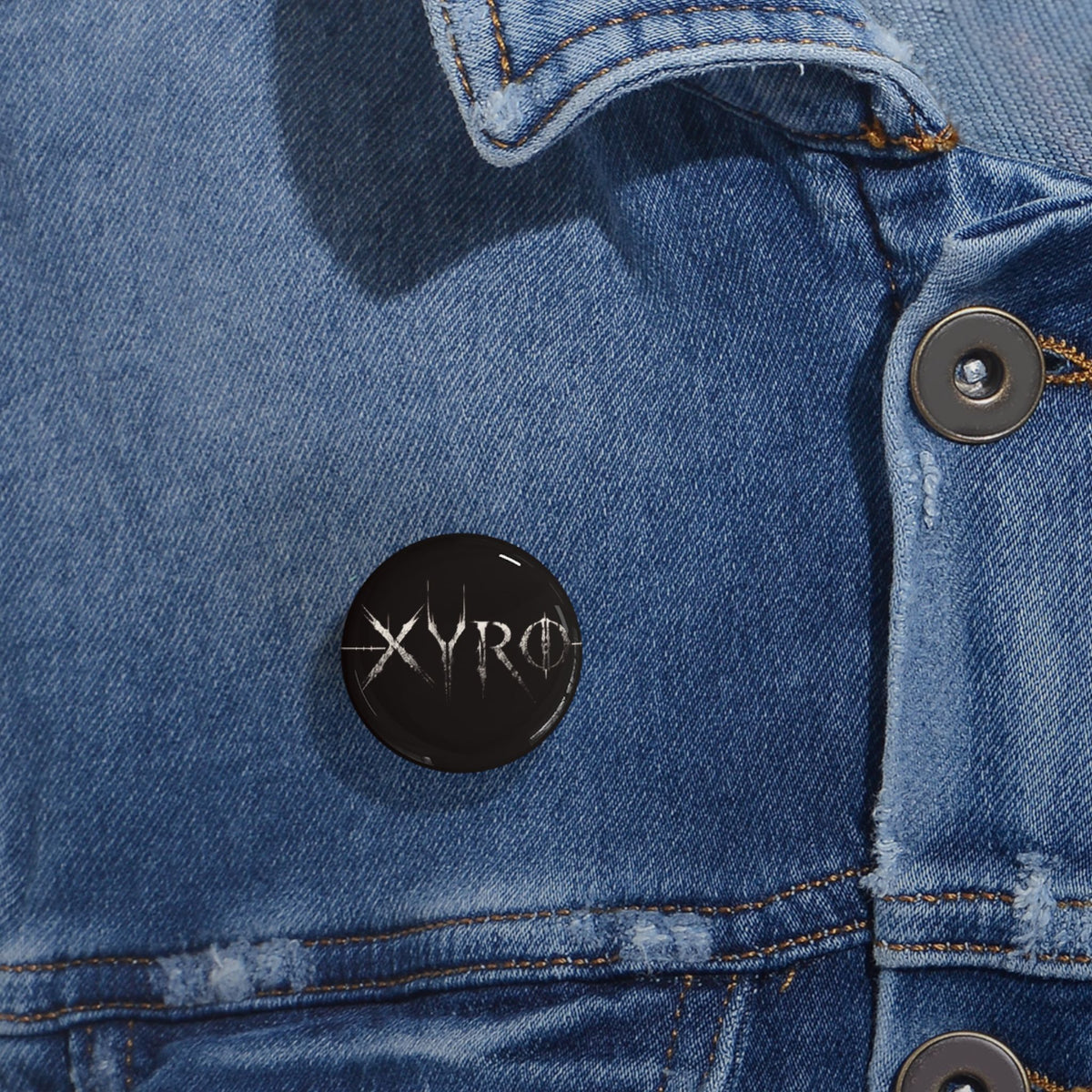 XYRO Black Logo Pin — Round Band Button Badge