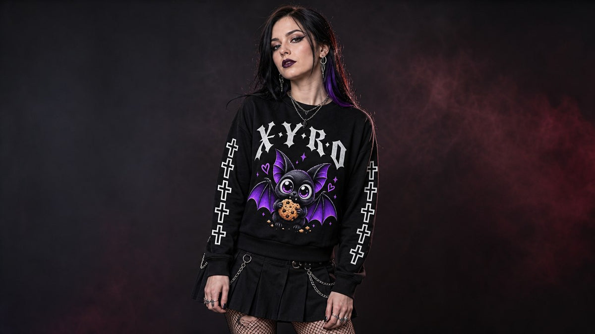 XYRO Vampire Bat Crewneck worn by a female goth model